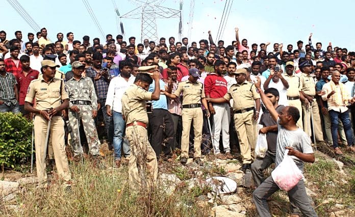People shower rose petals on Police personnel at the spot where accused in the rape and murder of the woman veterinarian were killed in an encounter, in Hyderabad on Friday | ANIPix