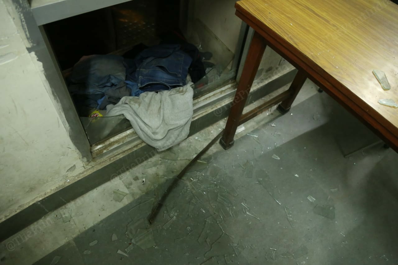 Set of clothes near the broken window | Photo: Manisha Mondal | ThePrint