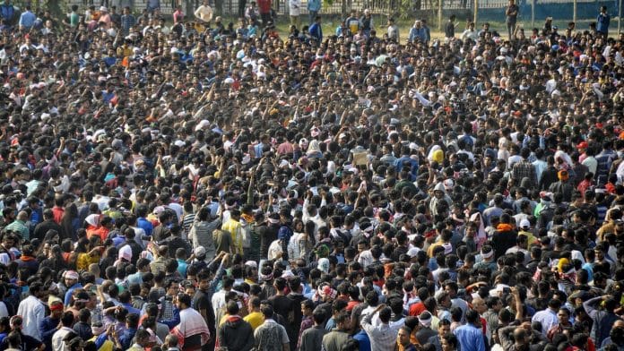 Protesters gather to defy curfew and protest against Citizenship Amendment Bill, in Guwahati | PTI