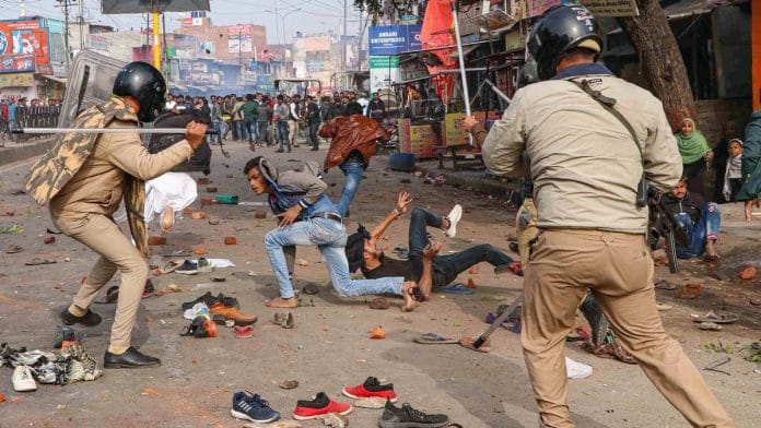 Police personnel baton charge at protestors during their rally against NRC and amended Citizenship Act that turned violent, in Lucknow, Thursday, Dec. 19, 2019. | PTI