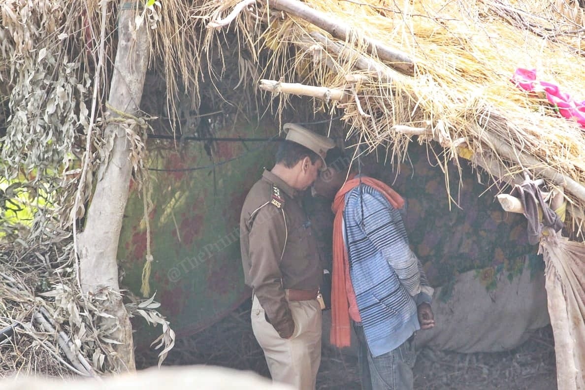 Police try to convince the family to go ahead with the burial as they wait for CM Adityanath | Praveen Jain | ThePrint