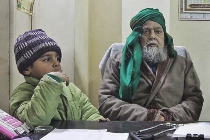An old man with his grandson in Gorakhpur