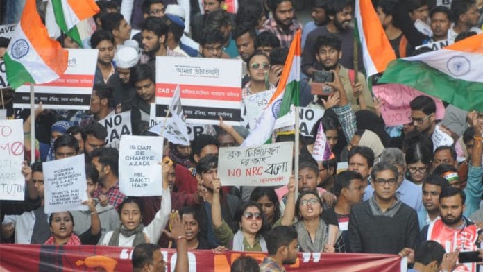 Anti-CAA protesters with banners