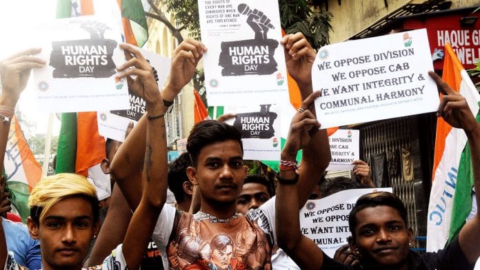 Members of West Bengal Indian National Trade Union Congress (INTUC) hold placards during a protest against the Citizenship (Amendment) Bill 2019, in Kolkata | ANI
