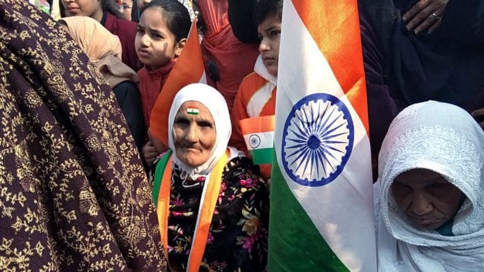 105-year-old woman Asma known as Dadi with mother of Rohit Vemula after hoisting the flag at Shaheen Bagh on 26 January 2020 (ANI Photo)