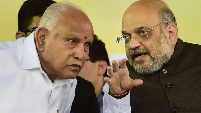 Karnataka CM B.S. Yediyurappa with Union Home Minister Amit Shah (R) in Bengaluru during the latter's visit to Karnataka Saturday