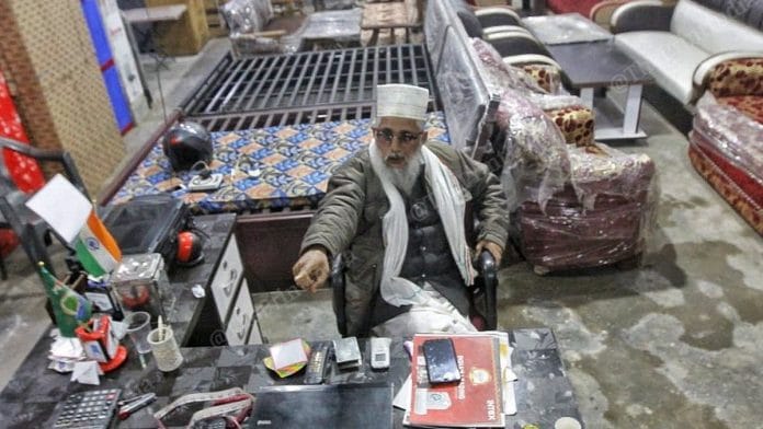 Mehendi Hasan at his electronics and furniture shop in Unchahar, on the border between Rae Bareli and Kunda districts of Uttar Pradesh | Photo: Praveen Jain | ThePrint