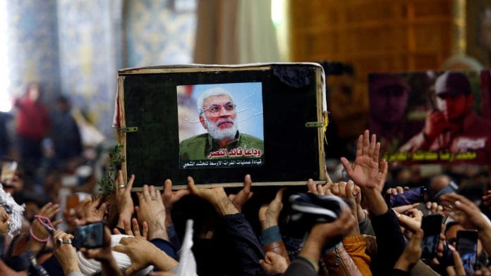 Mourners attend a funeral procession of the Iranian major general Qassem Soleimani at Imam Ali Shrine in Najaf on 5 January
