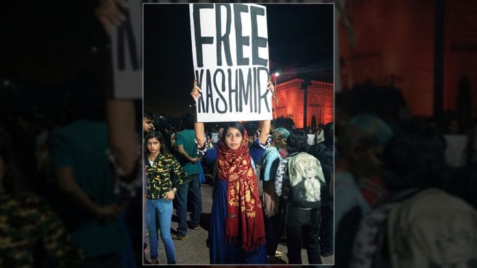 Mehek Prabhu holds the 'Free Kashmir' placard | ANI
