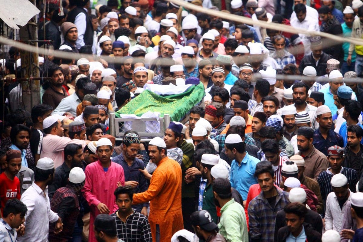 Hundreds join in as the Janaza passes through the area of Mustafabad, to take the bodies to the cemetery | Photo: Praveen Jain | ThePrint