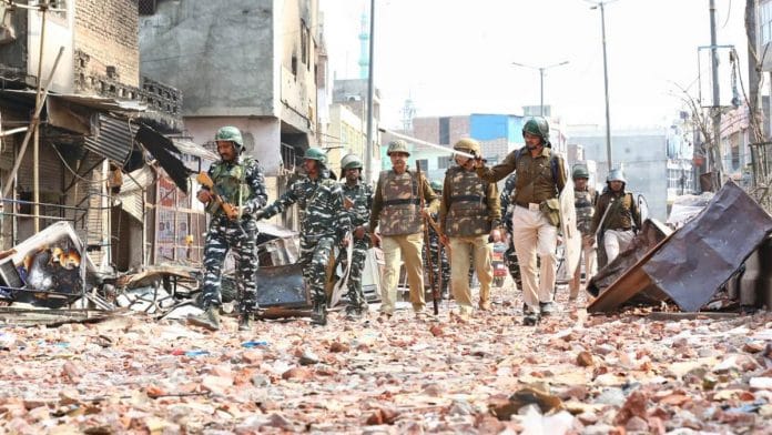 Delhi Police patrol the northeast district where riots broke out in February. At least 53 people had died in the violence | Suraj Singh Bisht | ThePrint