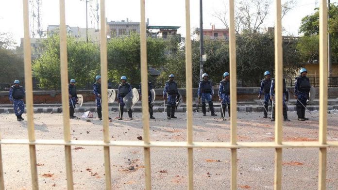 Security personnel on duty in Delhi's Kardam Puri on 25 February 2020 | Manisha Mondal | ThePrint