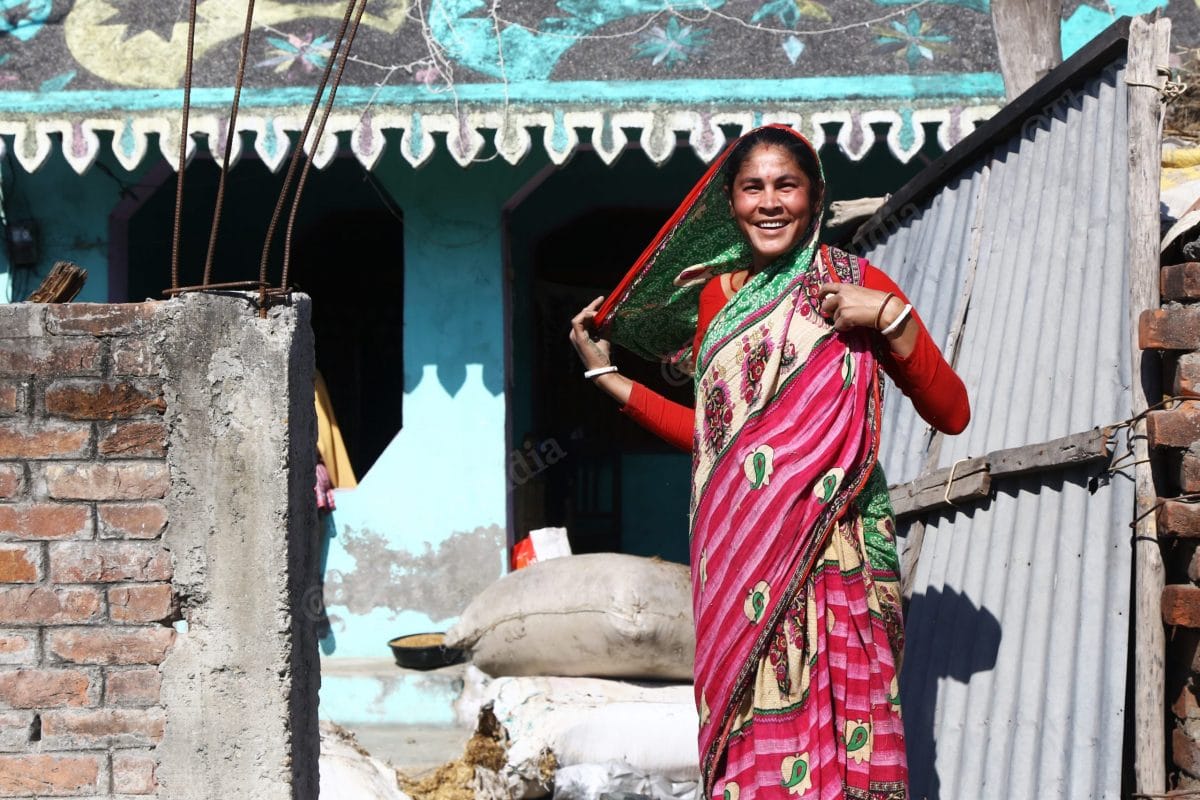 A married woman with the customary white and red bangles Bengali wives wear