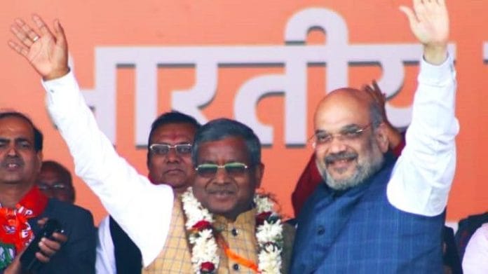 Amit Shah with Babulal Marandi after JVM(P) joined BJP