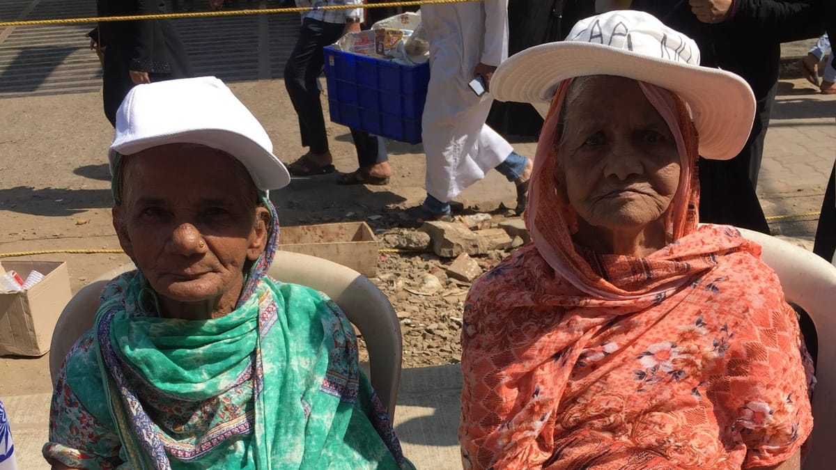 Kamrunissa (R) Khairunissa at the protest site