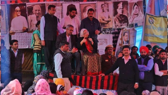 Senior advocates Sanjay Hegde and Sadhana Ramachandran address the protesters at Shaheen Bagh on 19 February 2020 | Manisha Mondal | ThePrint