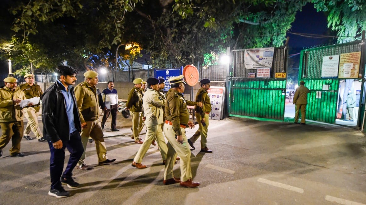 Security personnel arrive at the Atal Adarsh Bengali Girls Senior Secondary School, one of the counting centres for the Delhi Assembly polls | PTI