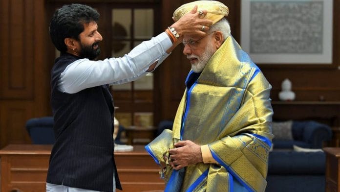 A file photo of Karnataka Tourism Minister C.T. Ravi with PM Narendra Modi