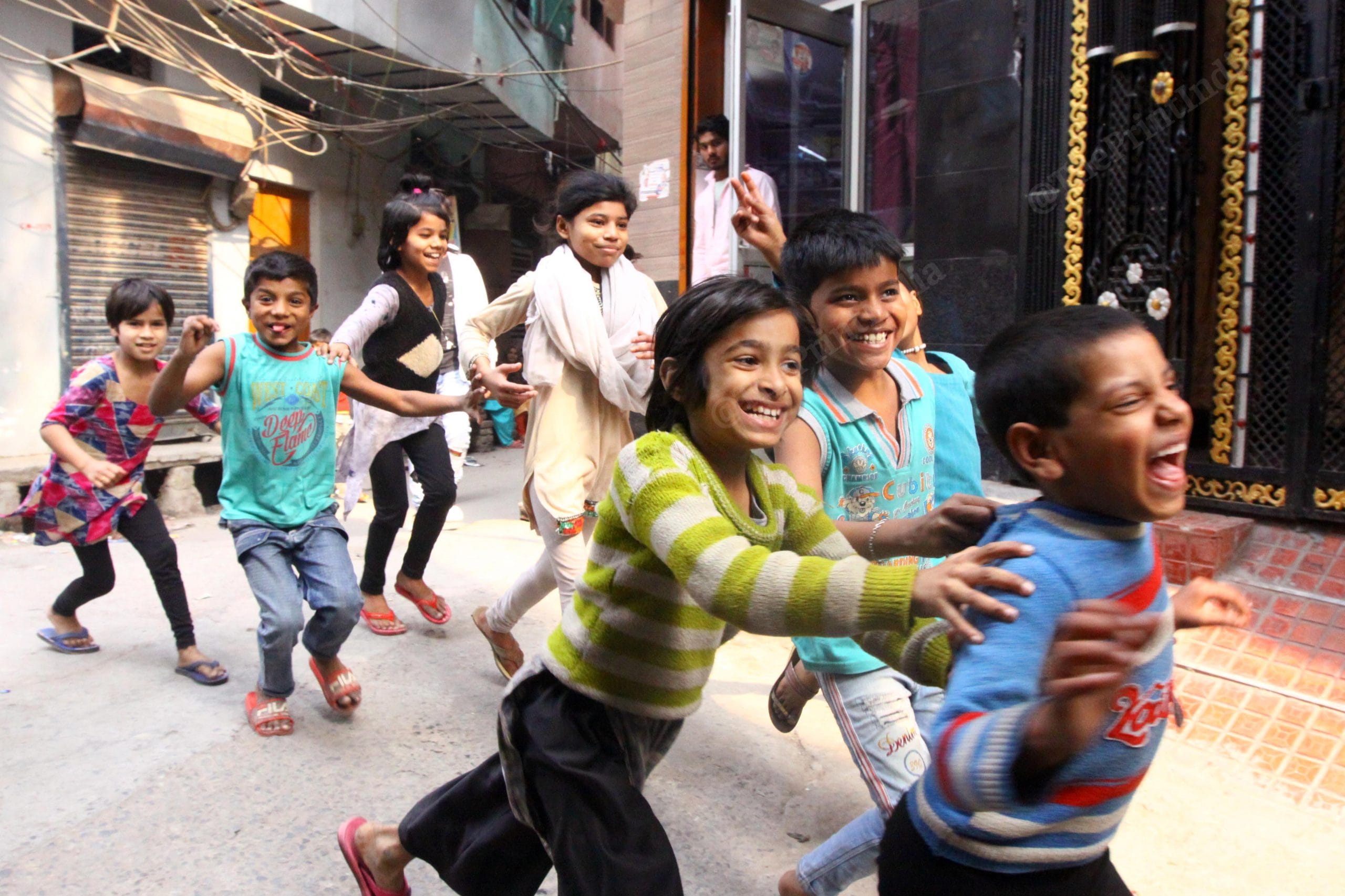 Children playing outside a shelter home in Babu Nagar | Photo: Praveen Jain | ThePrint