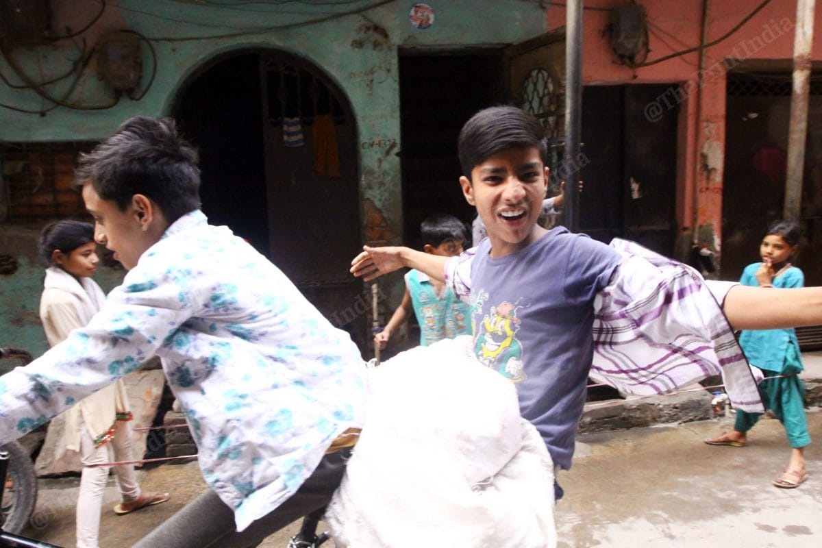 Two young boys enjoying a bicycle ride | Photo: Praveen Jain | ThePrint