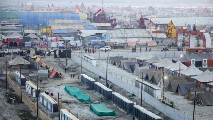 Portable toilets stand and accommodation tents for pilgrims at Tent City during the Kumbh Mela in Prayagraj, Uttar Pradesh, 2019 | Prashanth Vishwanathan/Bloomberg