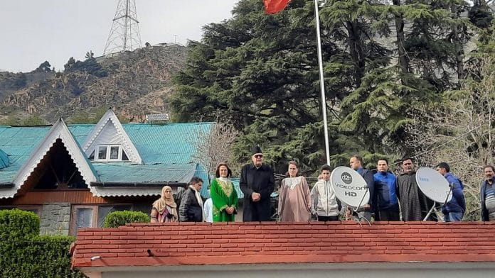 Photo caption: Farooq Abdullah, accompanied by his family, addresses the media at his Gupkar residence Friday | Photo: Azaan Javaid | ThePrint. 