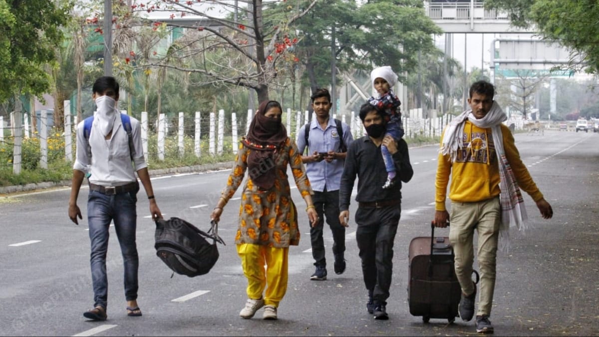 Avinash Pasi, a mason, leaving with his family and friends for Jhansi