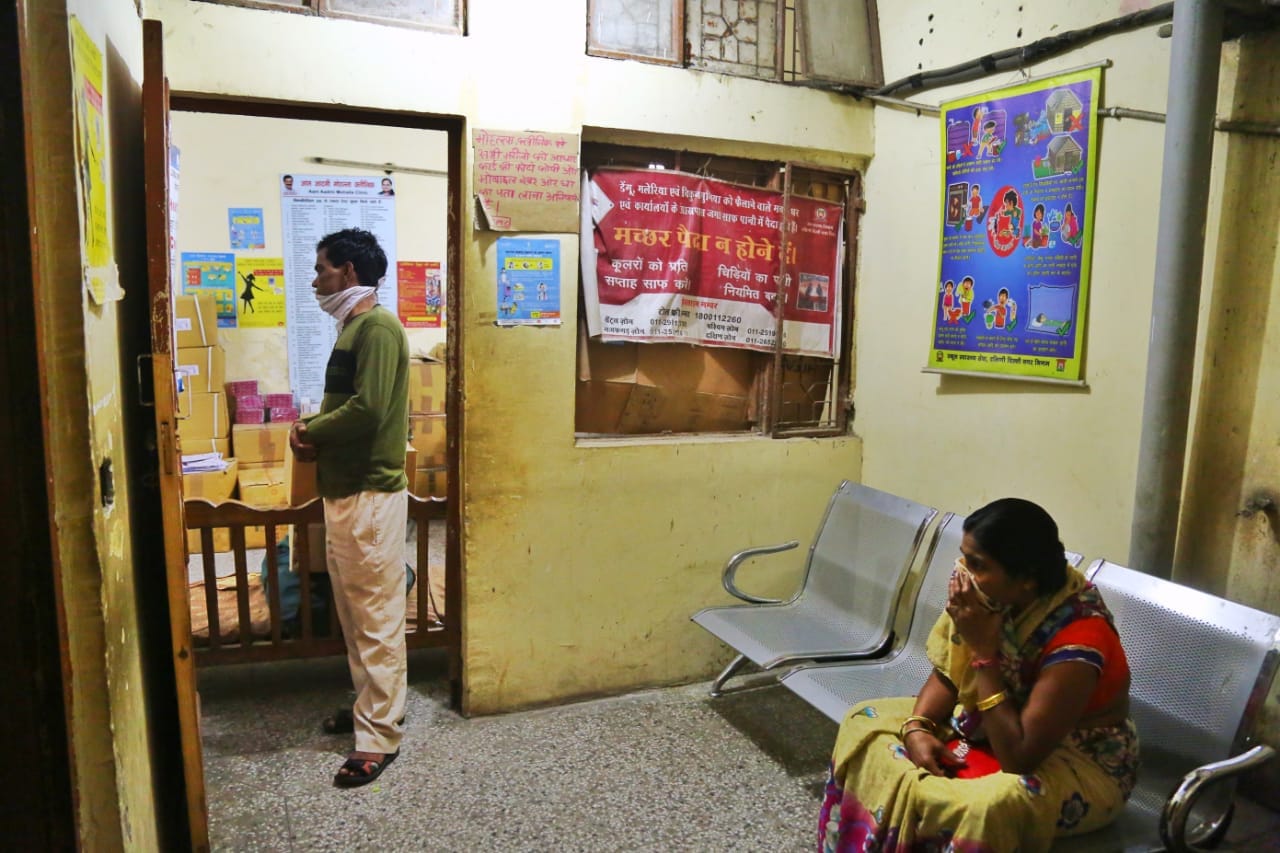 Patients wait at a mohalla clinic in Panchsheel Park