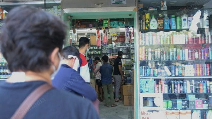 People queue up outside a chemist shop (representational image) | Photo: Manisha Mondal | ThePrint