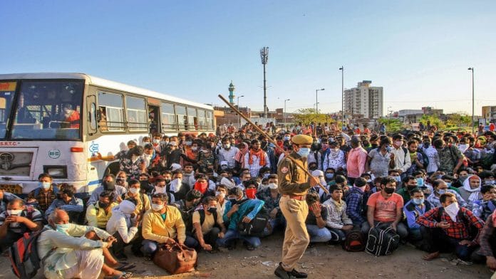 A file photo of migrant labourers gathered at a bus stand in Jaipur | PTI