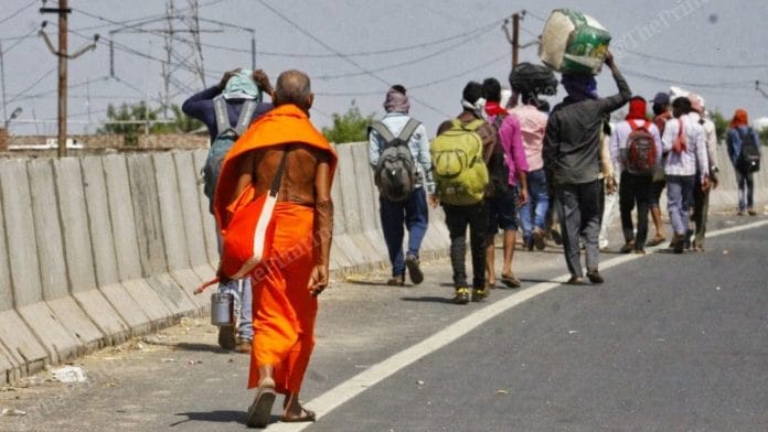 Migrant workers walk back to their villages amid the coronavirus lockdown in Uttar Pradesh | Photo: Praveen Jain | ThePrint
