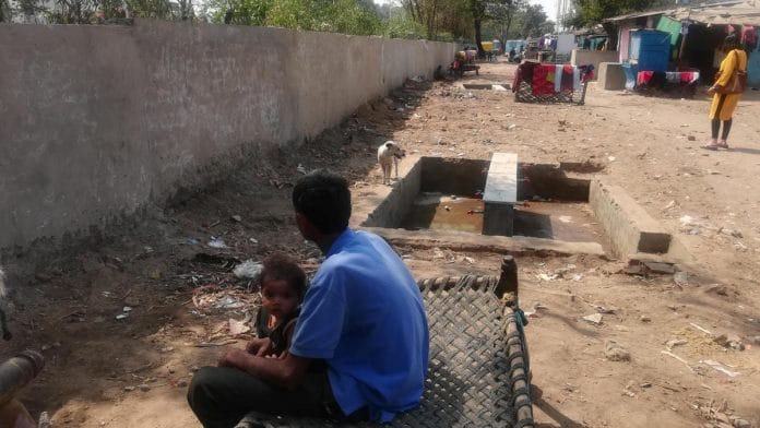 The wall that keeps the Saranias out of the 'VIP route' to Ahmedabad airport | Photo: Swagata Yadavar | ThePrint