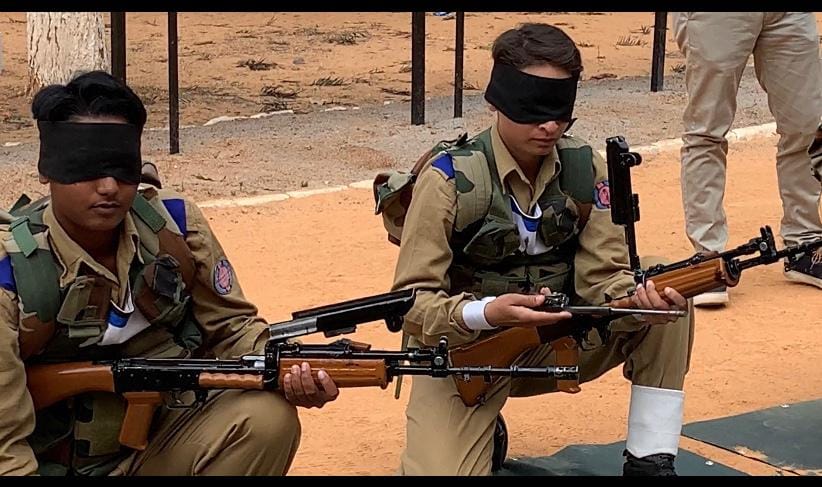 The recruits receive weapons training in blindfold 