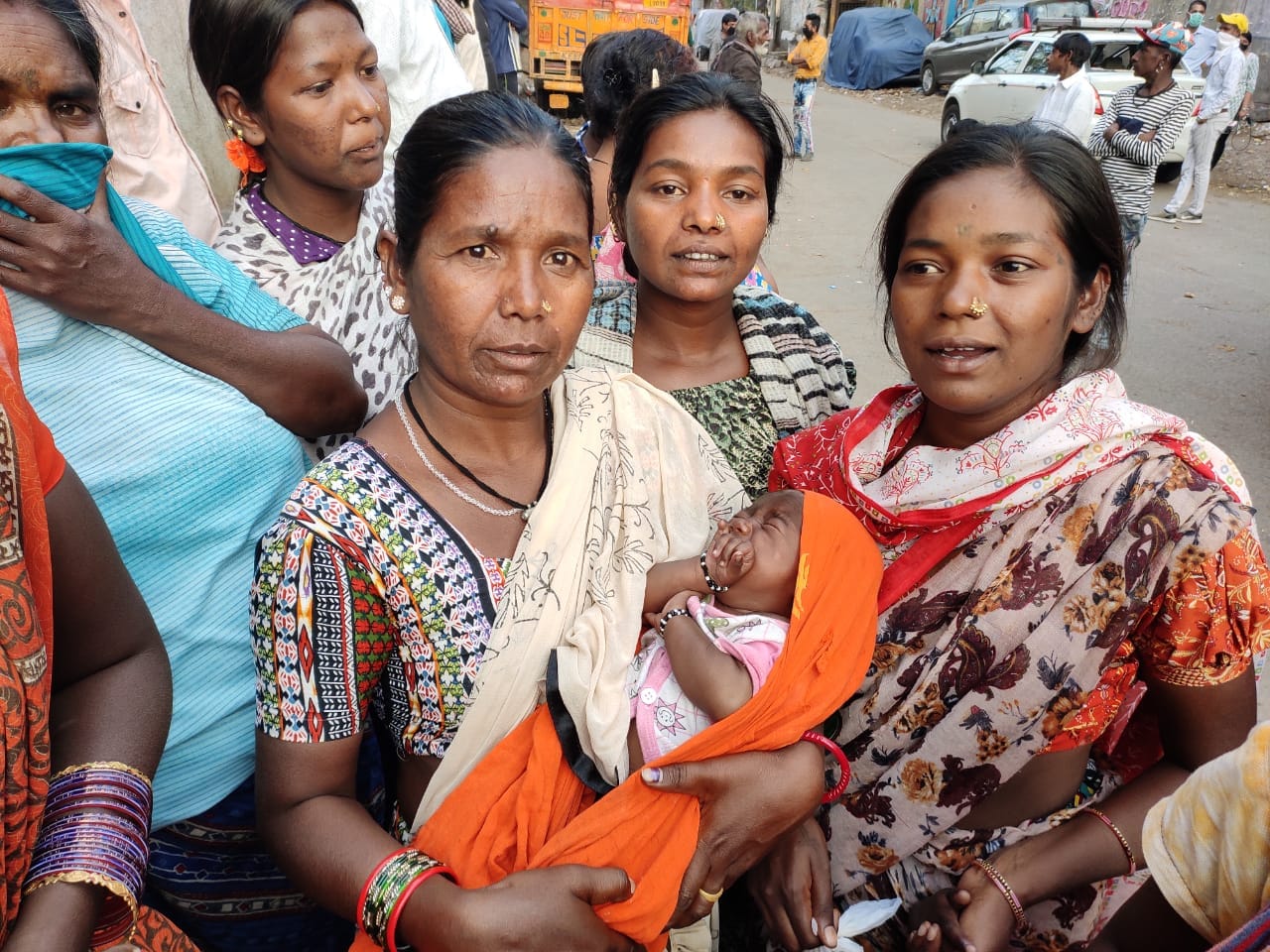 Saholi holds a crying baby in her arms | Simrin Sirur | ThePrint