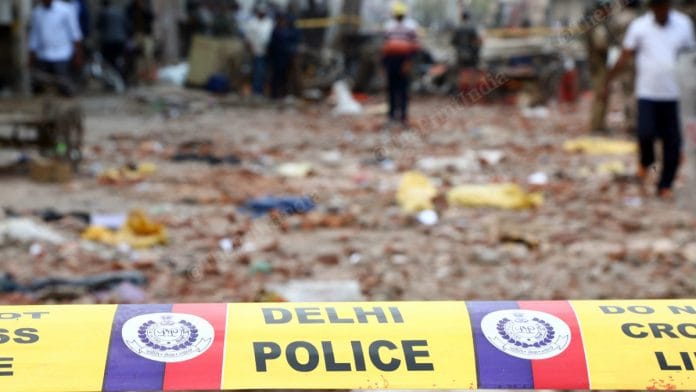 A police tape cordons off an area in Northeast Delhi that witnessed the communal riots | Photo: Suraj Singh Bisht | ThePrint
