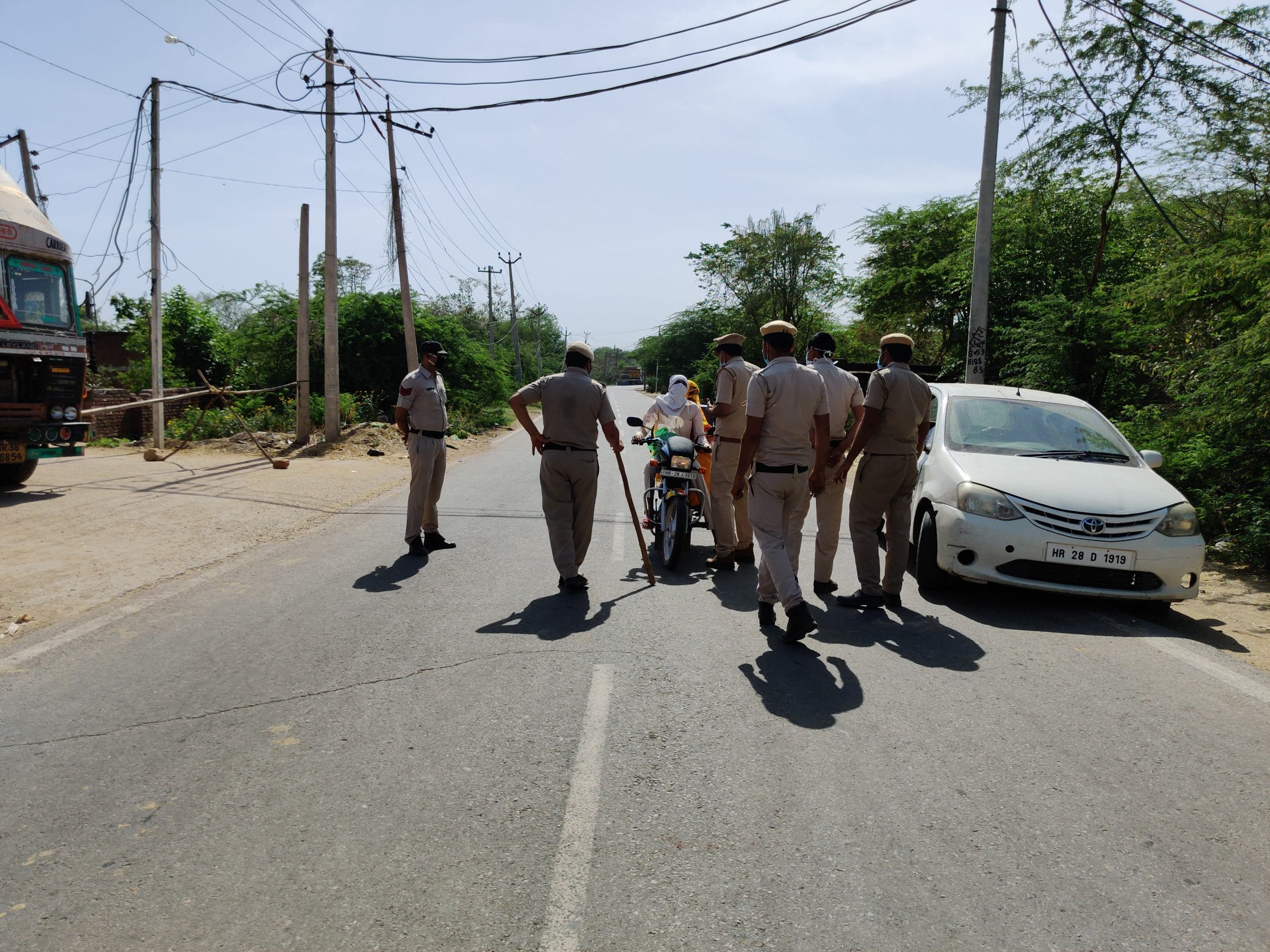 Police at the entry to Khanpur Ghati village | Photo: Sajid Ali | ThePrint