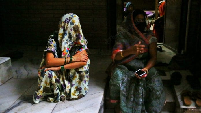 Anita Singh (left), mother of the deceased child, with a relative at their home in Agra | Photo: Suraj Singh Bisht | ThePrint