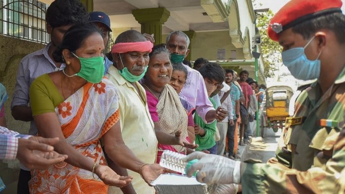 Army personnel distribute packaged food to the homeless in Chennai on 31 March 2020 | PTI