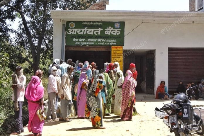 Another day of wait outside a branch of Aryavart Bank, a regional rural bank, in Piswan
