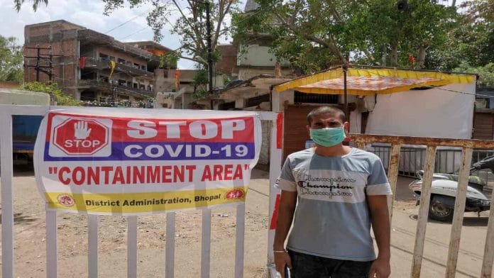 The son of Naresh Khatik, Bhopal's first Covid-19 casualty, outside Ibrahimganj | Angana Chakrabarti | ThePrint