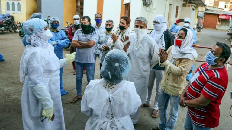 Doctors, hospital workers are also fighting abuse and violence as virus stigma, panic grows