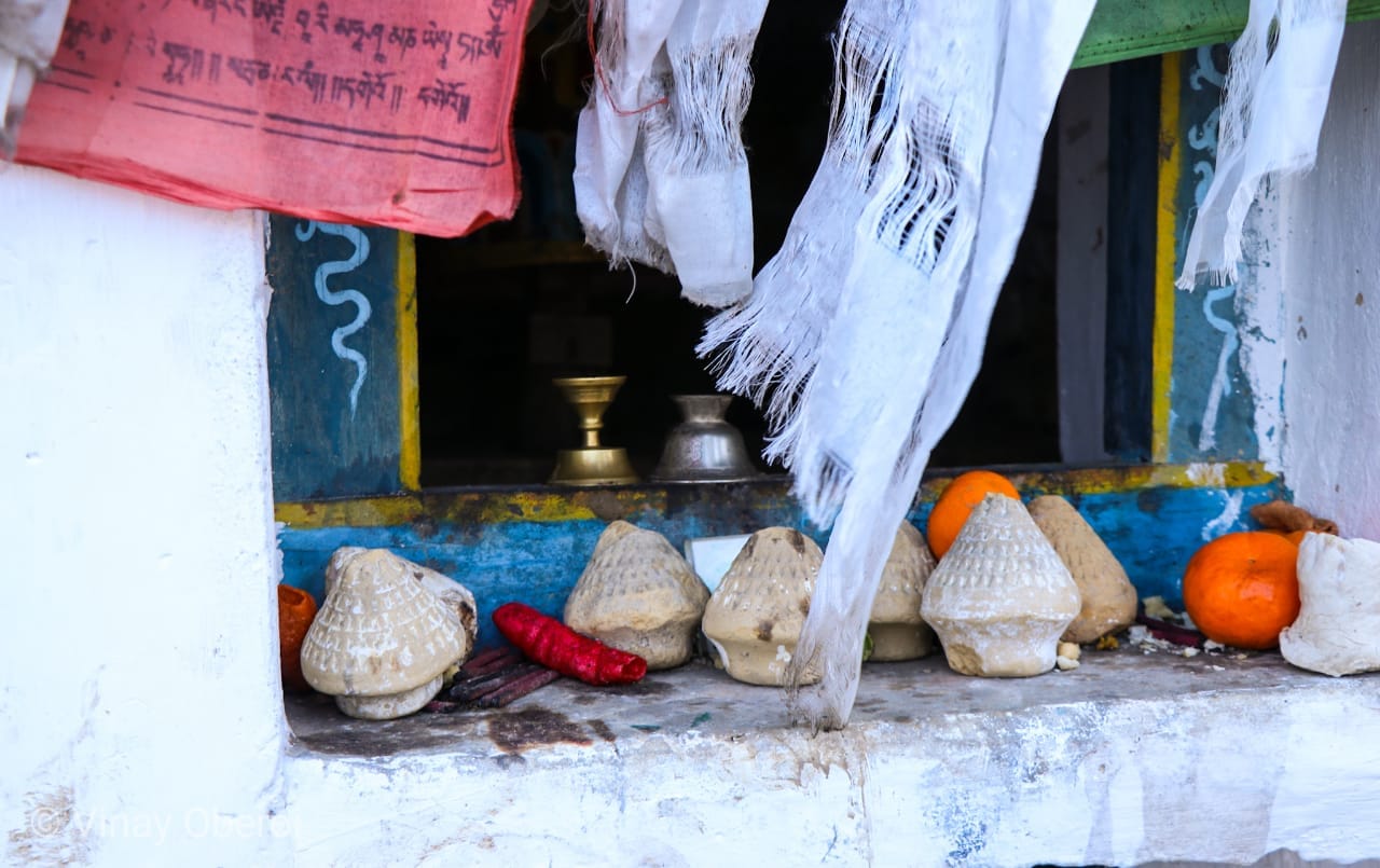 Little pagodas made from flour, some coloured, at a small shrine on the road to Dirang | Vinay Sheel Oberoi