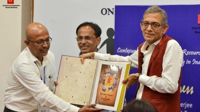 Abhijeet Choudhury (centre) with Prof Abhijit Banerjee (right) | Photo: Facebook