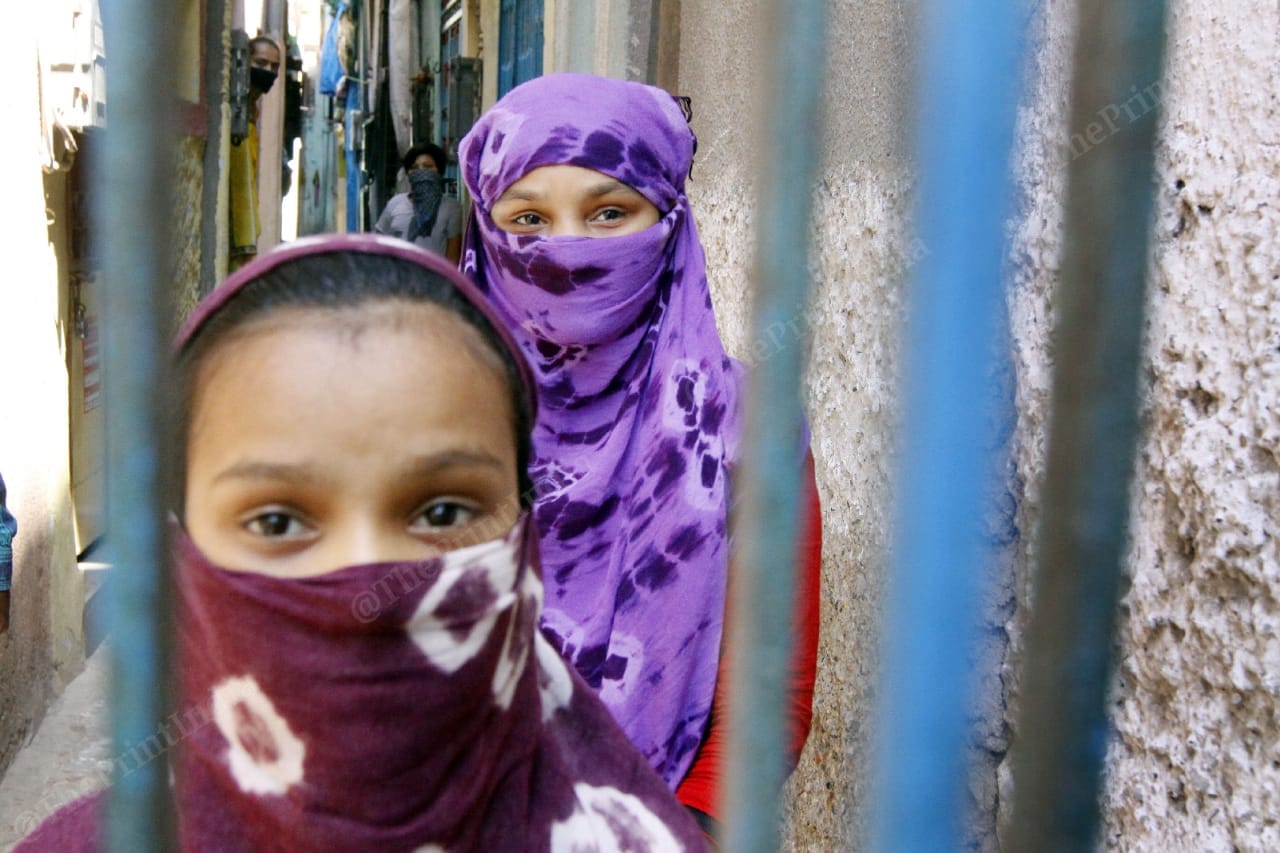Rekha Maheshwari Parmar (right) and her sister Priyanka in Ahmedabad's Behrampur locality. | Photo: Praveen Jain/ThePrint