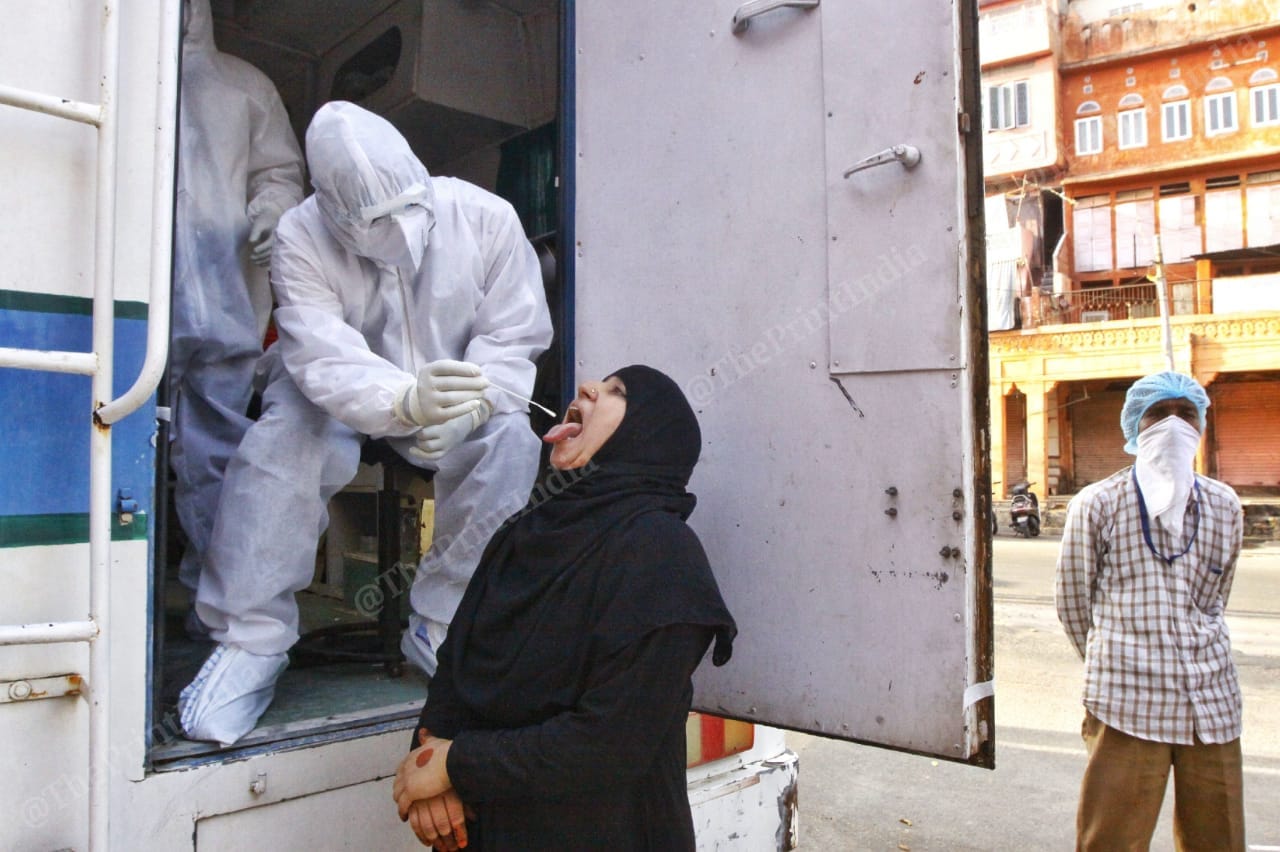 A woman being tested for Covid-19 in Jaipur's Ramganj. | Photo: Praveen Jain/ThePrint