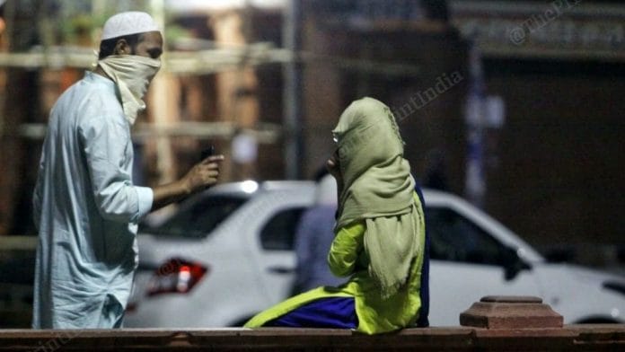 A father advises his daughter before she leaves for the isolation ward for Covid-19 patients in Jaipur. | Photo: Praveen Jain/ThePrint