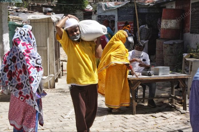 People outside the Dalibagh ration shop in Lucknow. | Photo: Praveen Jain/ThePrint
