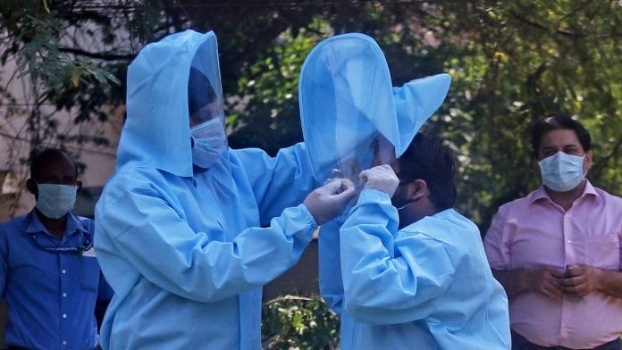 PPE kits being distributed to essential services workers in New Delhi | Representational image | ANI