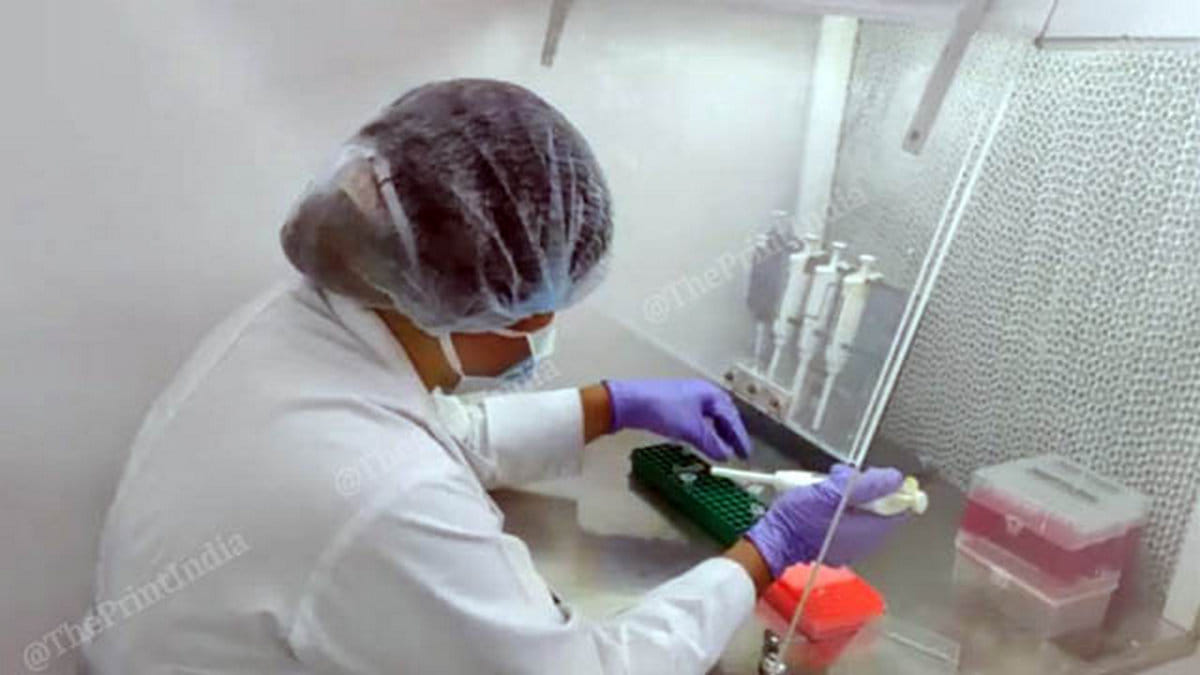 Senior resident Dr Aditi performs the RT-PCR test | Photo: Angana Chakrabarti | ThePrint