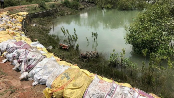 To prevent flooding due to cyclone Amphan, villagers had built bunds using sandbags | Madhuparna Das | ThePrint